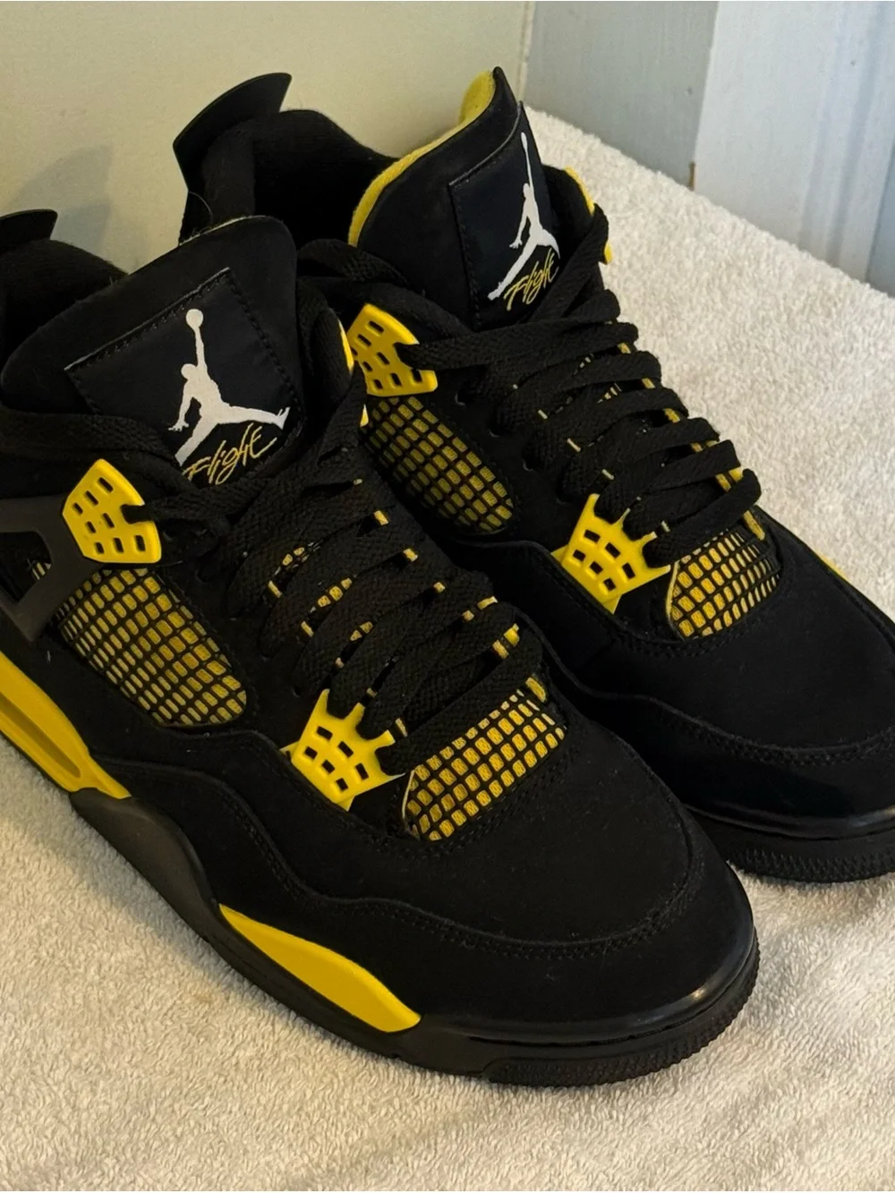 Jordan Men’s Black and Yellow Retro Sneakers